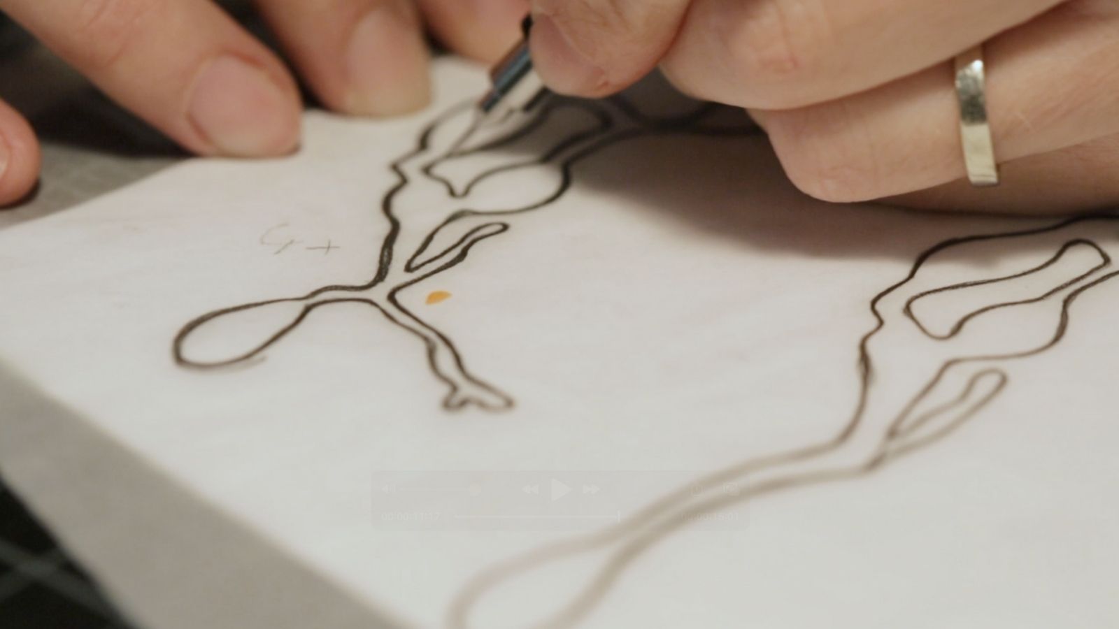 Denisa Piatti is sketching a design for a piece from her Seaweed Collection